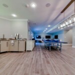 Corrigan luxury extends below the ground to the walk out basement with high ceilings, lots of space and natural light to live, play and eat in