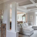 Custom-designed coiffured ceilings and beaded columns.